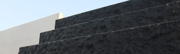 Keerwanden keerwand speciaal antraciet structuur kleurbeton grond opslag erfafscheiding betonwand